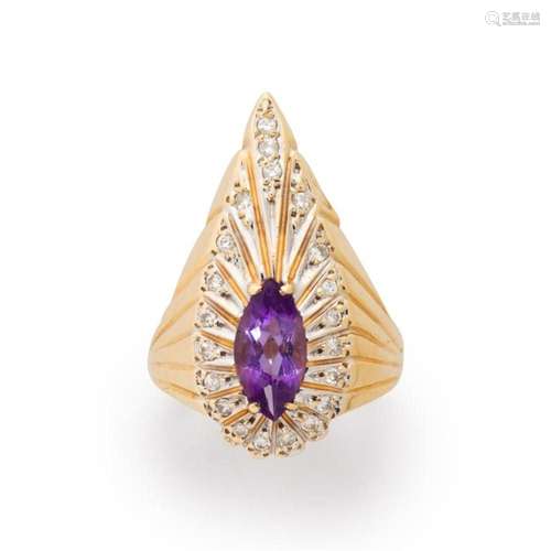 An amethyst, diamond and fourteen karat bi-color gold ring