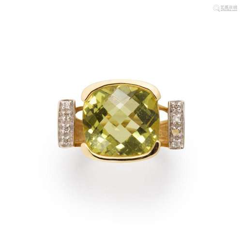 A yellowish green quartz, diamond and fourteen karat gold ri...