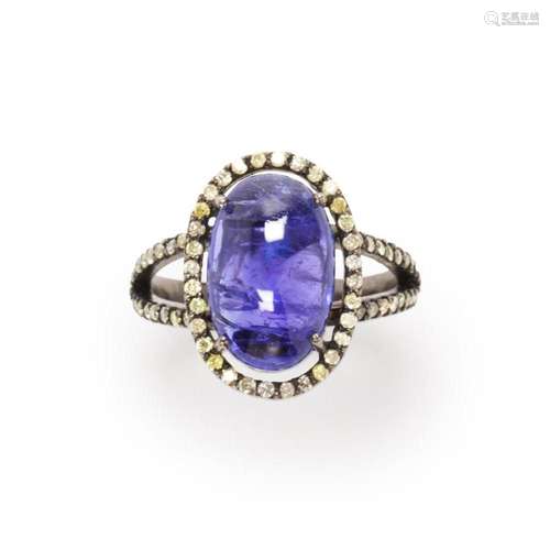 A tanzanite and diamond ring