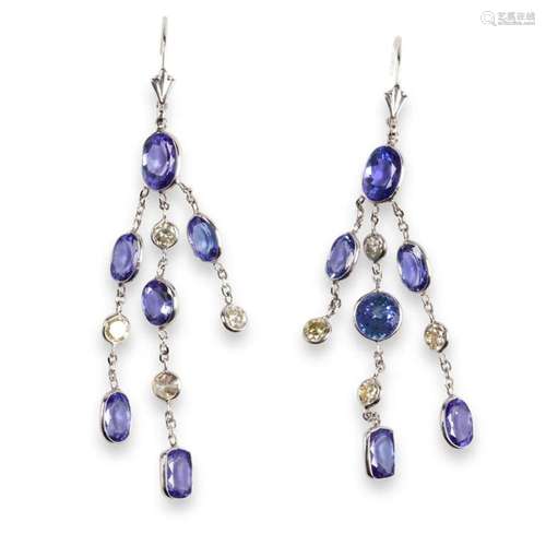 A pair of tanzanite, yellow diamond and fourteen karat white...