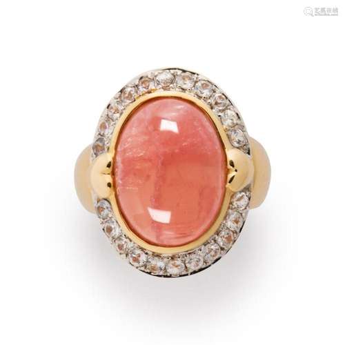 A pink hardstone, white sapphire and fourteen karat gold rin...