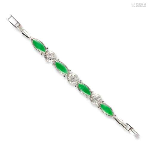 A jade and eighteen karat white gold bracelet