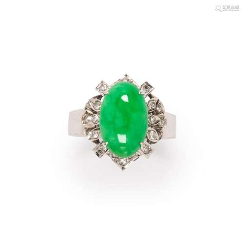 A jadeite, diamond and eighteen karat white gold ring