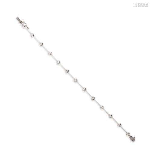 A diamond and eighteen karat white gold bracelet