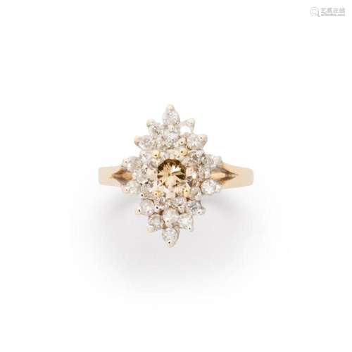 A champagne diamond, diamond and fourteen karat gold ring