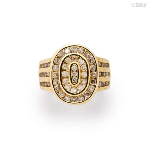 A diamond and fourteen karat gold ring