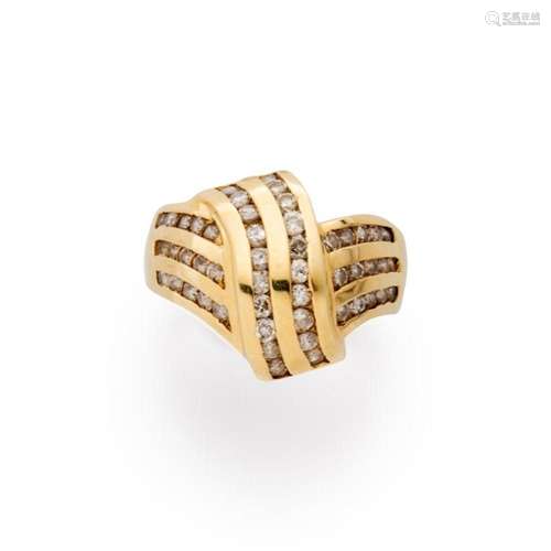 A diamond and fourteen karat gold ring