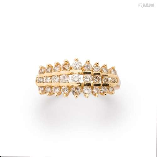 A diamond and fourteen karat gold ring