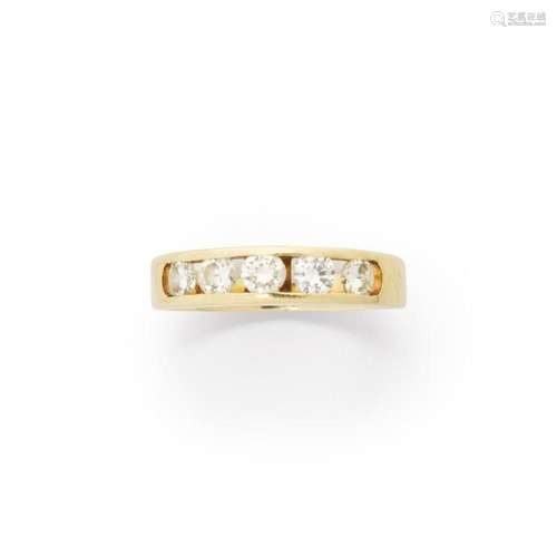 A diamond and fourteen karat gold ring