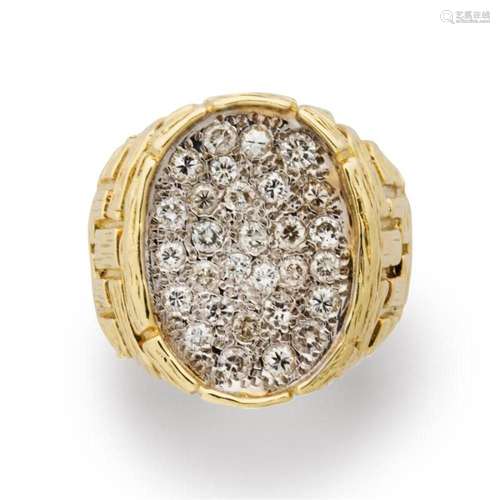 A diamond and fourteen karat gold ring