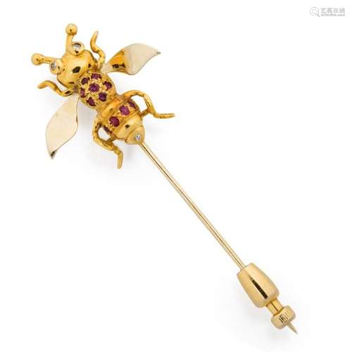 A gemstone and eighteen karat gold stick pin