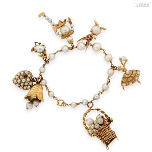 A pearl and fourteen karat gold bracelet