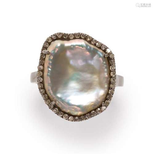 A blister pearl and diamond ring