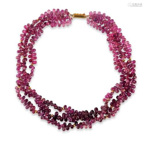 A tourmaline and eighteen karat gold necklace