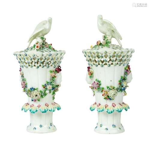 A pair of English porcelain vases with covers