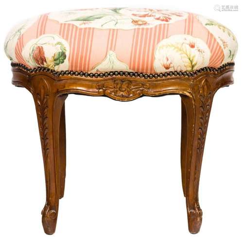 A Louis XV style carved ottoman