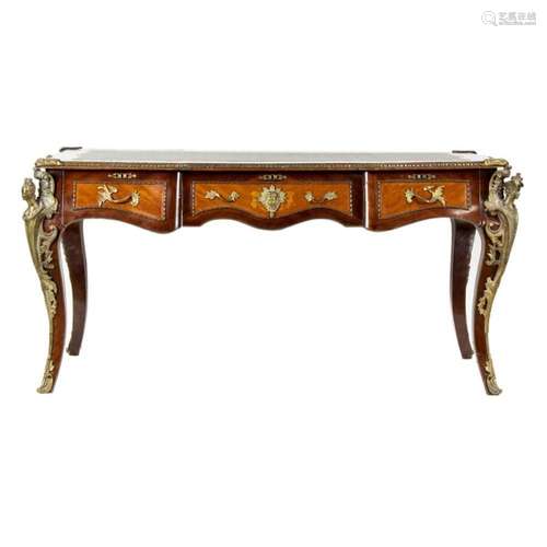 A Louis XV style gilt metal mounted bureau plat