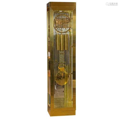 A Howard Miller contemporary nine tube tall case clock