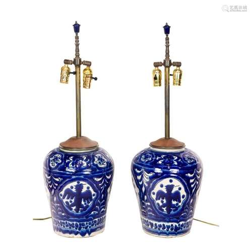 A pair of Mexican Talavera blue and white pottery urns drill...