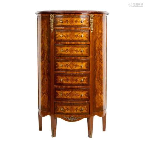 A marquetry decorated lingerie chest in the French taste