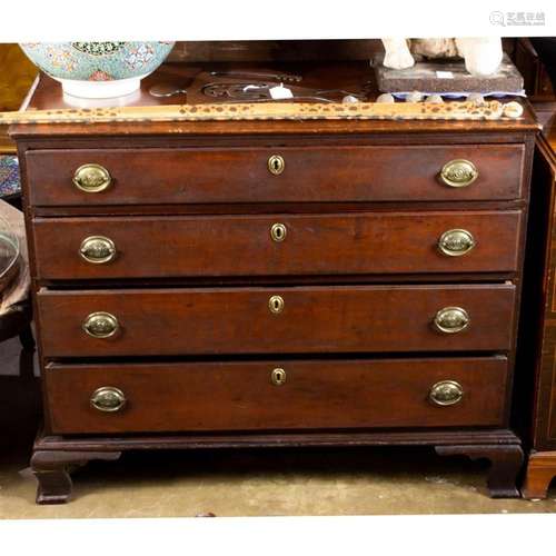 A Chippendale cherry chest of drawers