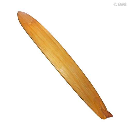 An early Hobie balsa wood surfboard circa 1950