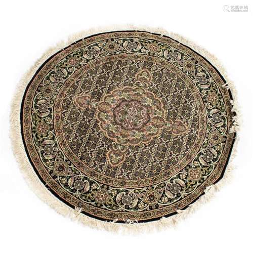 A Sino Tabriz circular carpet