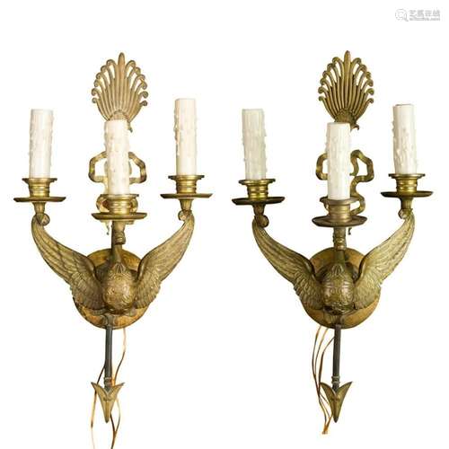 A pair of Empire style gilt bronze wall sconces circa 1909