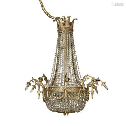 A massive and important Empire style gilt bronze and crystal...