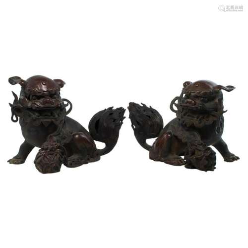 Pair of Chinese bronze guardian lions