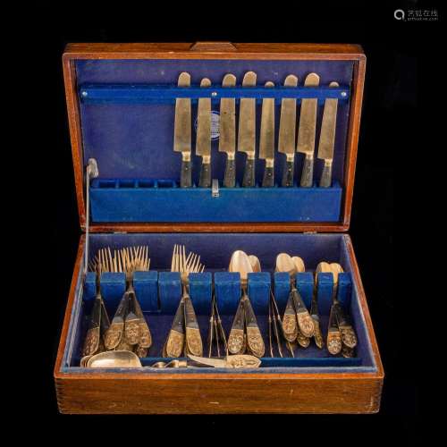 (52 pc) Siamese brass and wood mounted flatware in silver ch...