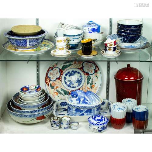 Two shelves of Asian porcelain