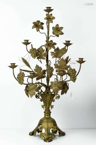 An Aesthetic seven light flowering gilt brass candelabra