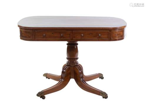An English Regency mahogany table with cross banded top