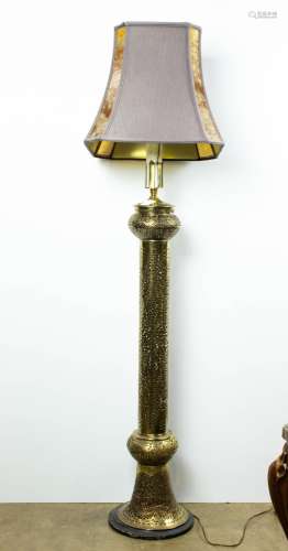 An Indian brass temple floor lamp