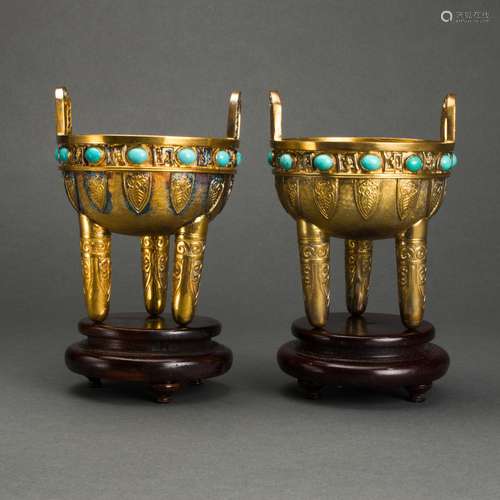 Pair of Chinese gilt bronze tripod censers