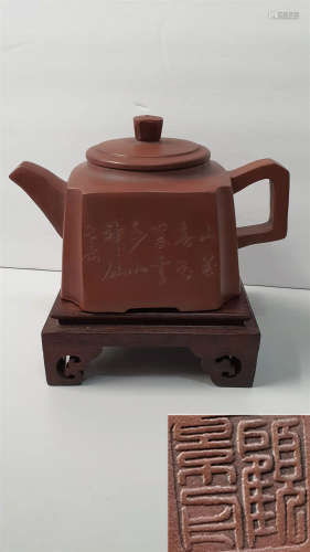 old. Purple clay teapot.