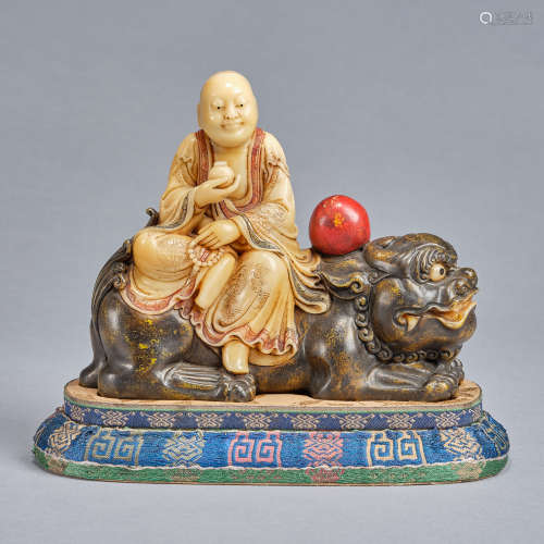 A soapstone carving of 'buddha and lion',Qing dynasty