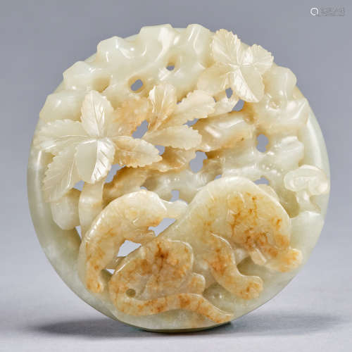 A jade reticulated 'tigers' belt buckle, Yuan dynasty