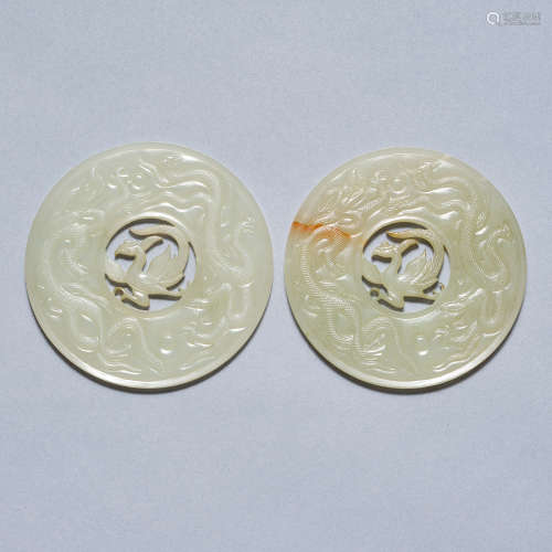 A pair of jade 'phoenix' Bi discs, Warring States period