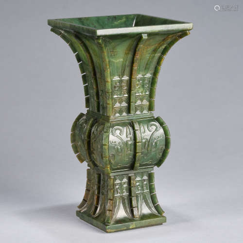 A large spinach-green jade Gu-form vase,Qing dynasty