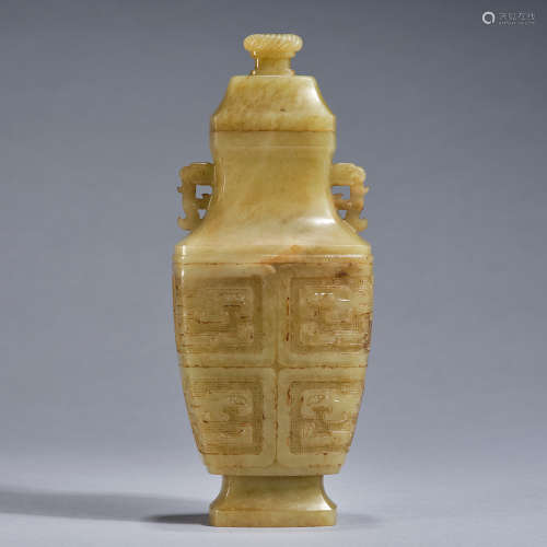 A yellow jade 'animals'-handled vase,Warring states
