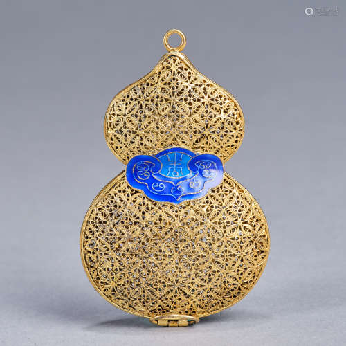 A reticulated gilded silver 'gourd-shaped' pendant,Qing dyna...