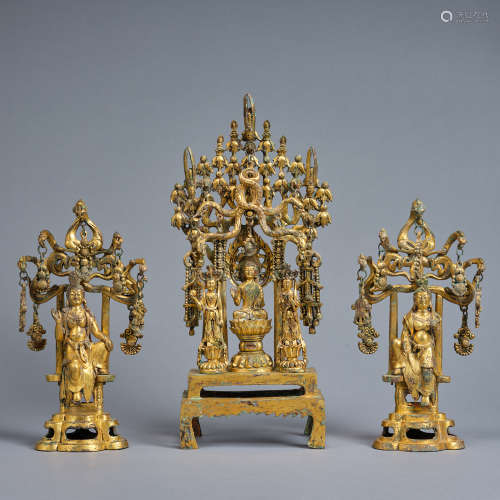 A set of three gilt-bronze figures of Buddha,Tang dynasty