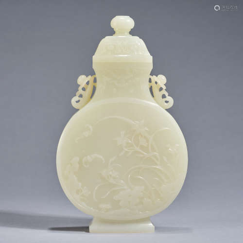 A jade handled 'floral' vase,Qing dynasty