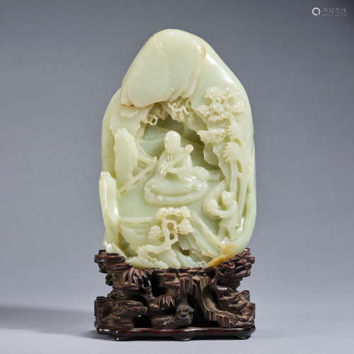 A jade 'buddha' mountain with wood stand,Qing dynasty