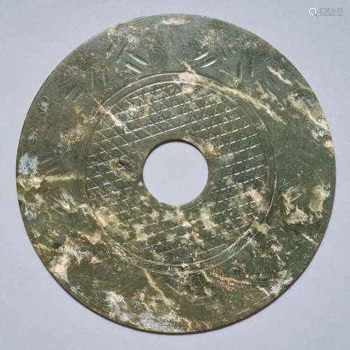 A large jade 'mythical animal' Bi disc, Warring States perio...