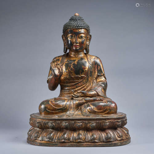 A large gilt-copper alloy figure of stting Buddha ,Qing dyna...
