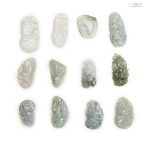 GROUP OF 12 JADE /  VARIED STONE TOGGLE