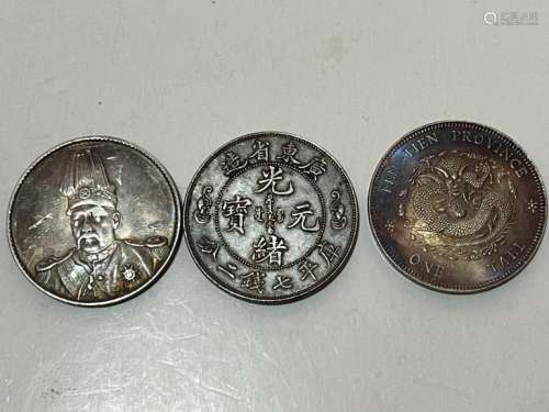 Three Chinese Coins